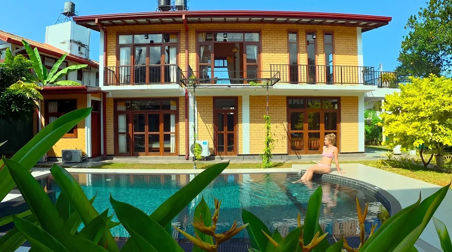 Relaxing beside the private pool in front of the villa — Syndeo Garden, Hikkaduwa
