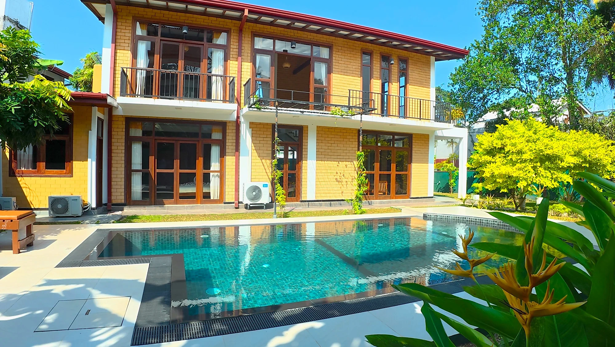 Two-storey villa beside its private swimming pool — Syndeo Garden, Hikkaduwa