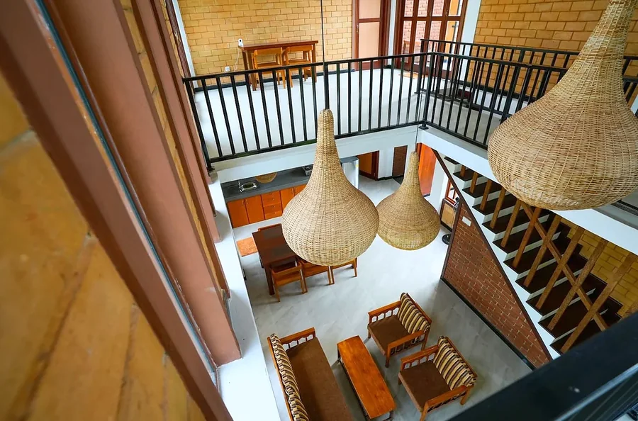 View from the upper gallery into the living area — Syndeo Garden, Hikkaduwa