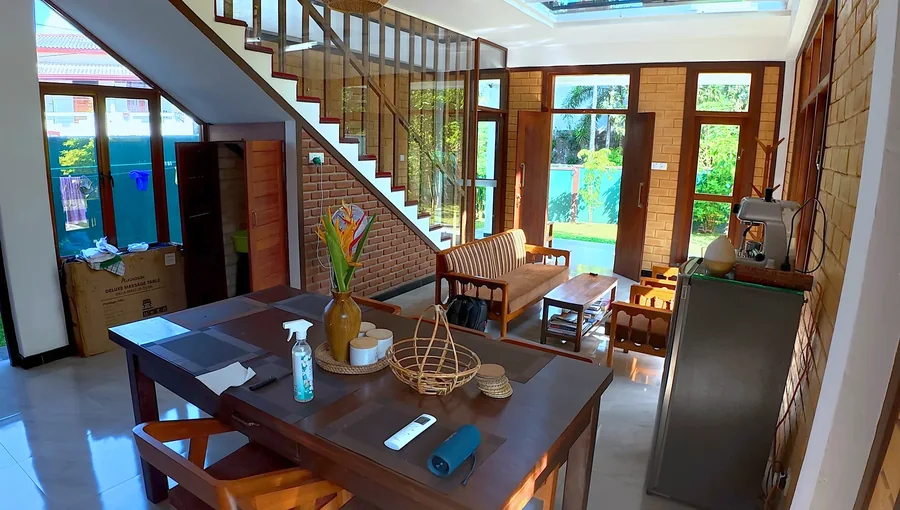 Wooden dining table and chairs in the villa — Syndeo Garden, Hikkaduwa