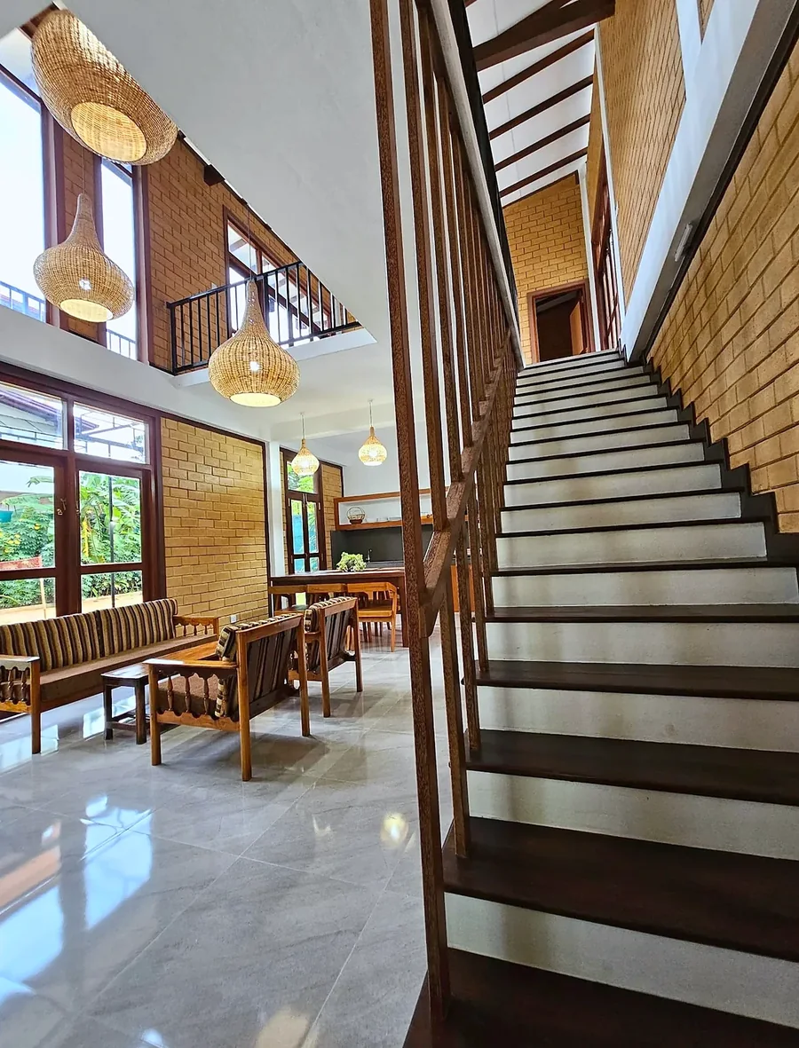 Wooden staircase and upper gallery — Syndeo Garden, Hikkaduwa